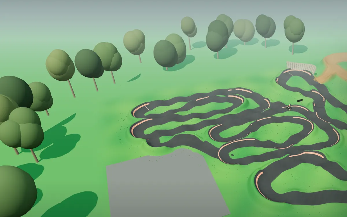 Pump It: the 3D pump track from above, ringed by trees